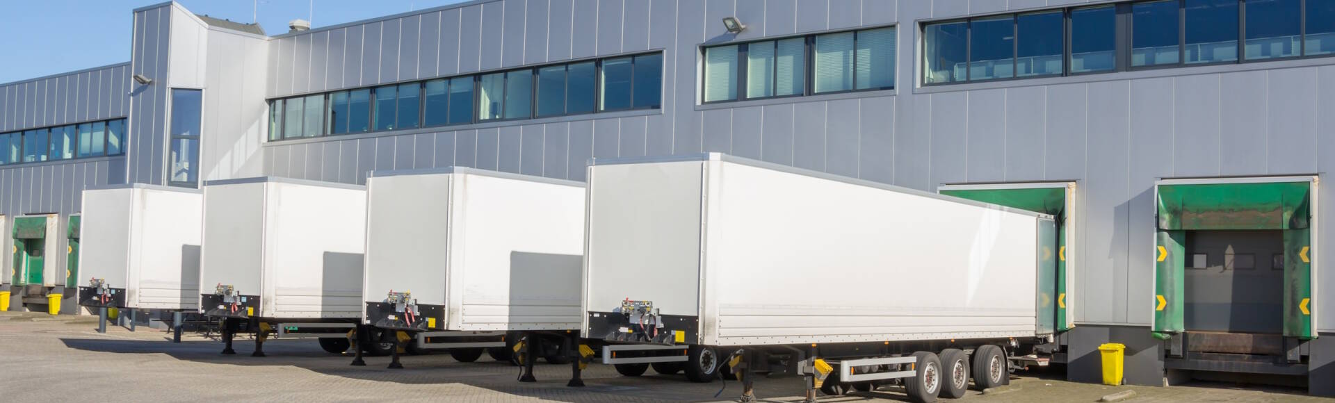 Distribution centre with trailers waiting to be loaded